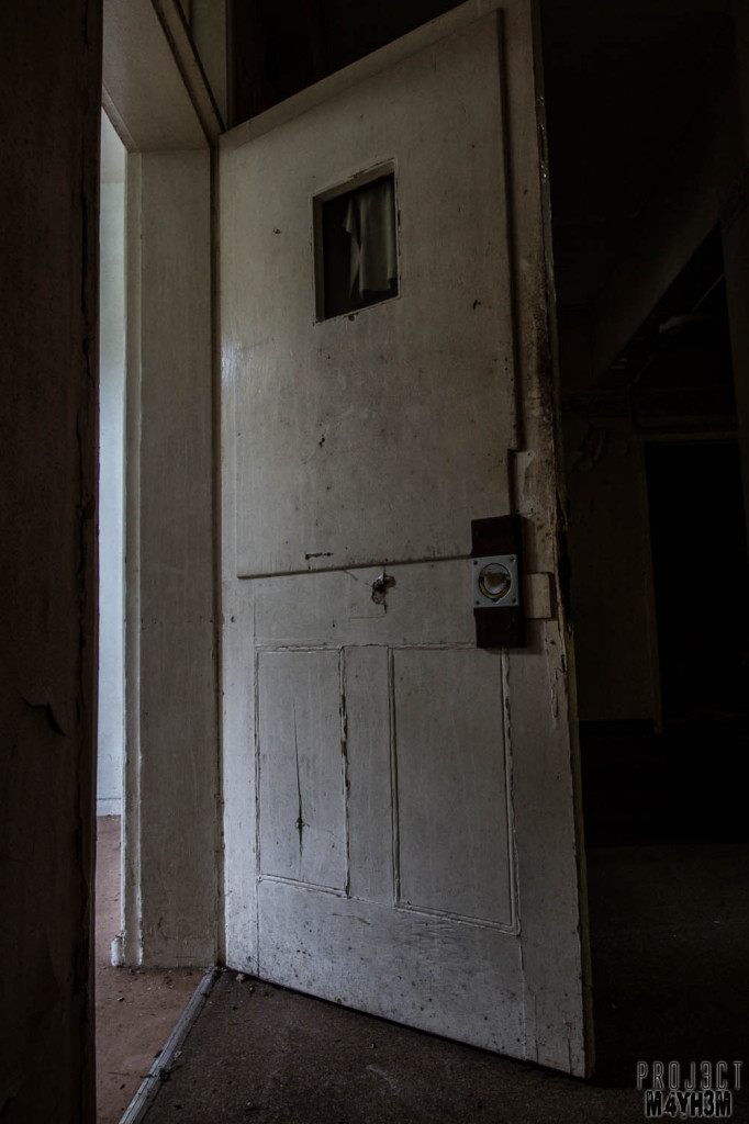 OM Asylum Cell Door